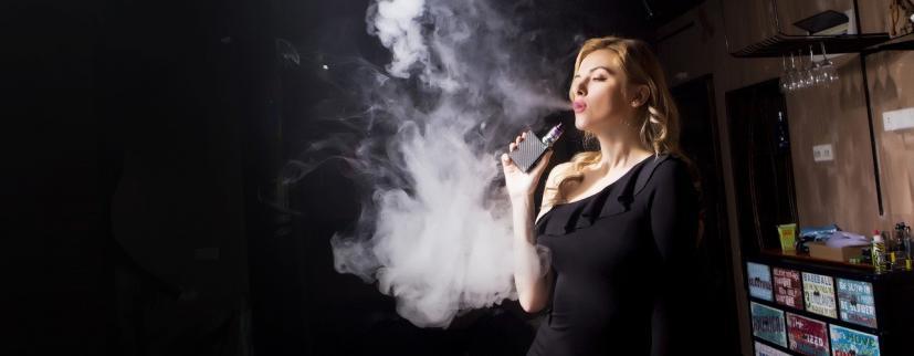 a woman vaping