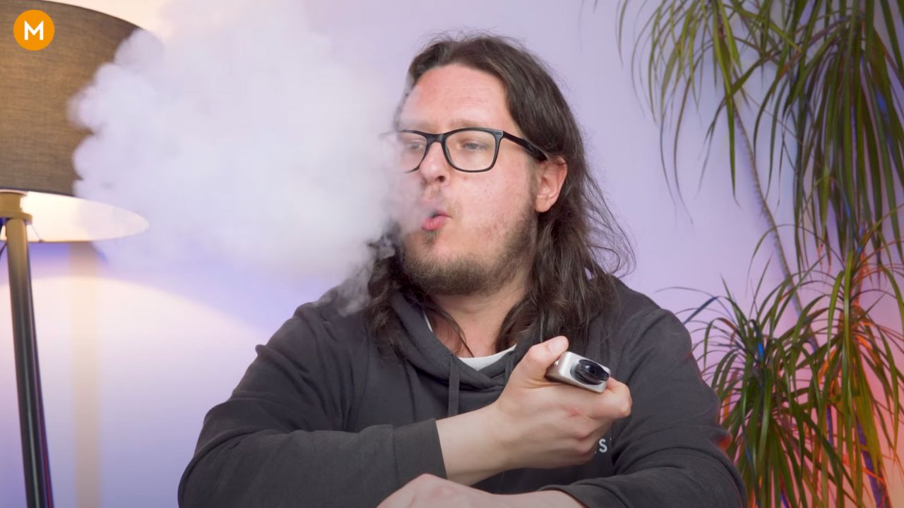 Aiden from MIST UK showing how to vape