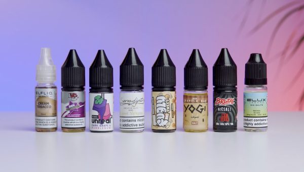 photo showing all the best nic salt vape juices on a table.