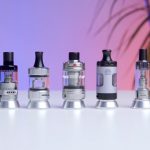 Photo of all the best vape mouth to lung vape tanks in 2023 on a table.