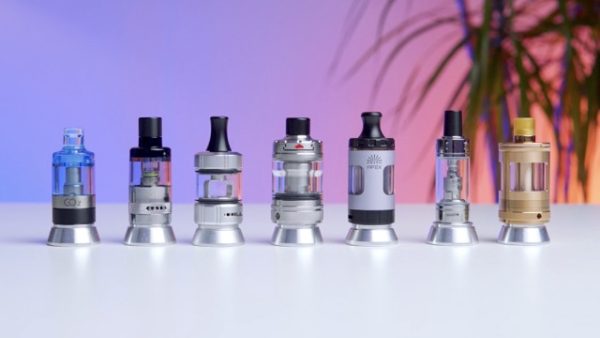 Photo of all the best vape mouth to lung vape tanks in 2023 on a table.