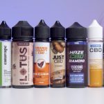 Different CBD e-liquids on a table