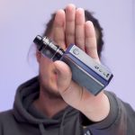 Aiden from MIST holding the Drag 5 for a review