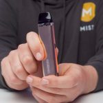 Aiden from MIST UK holding a Trine SE for a review