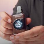 Aiden from MIST UK holding an OXVA XLIM XQ Pro 2 for the best small vape review
