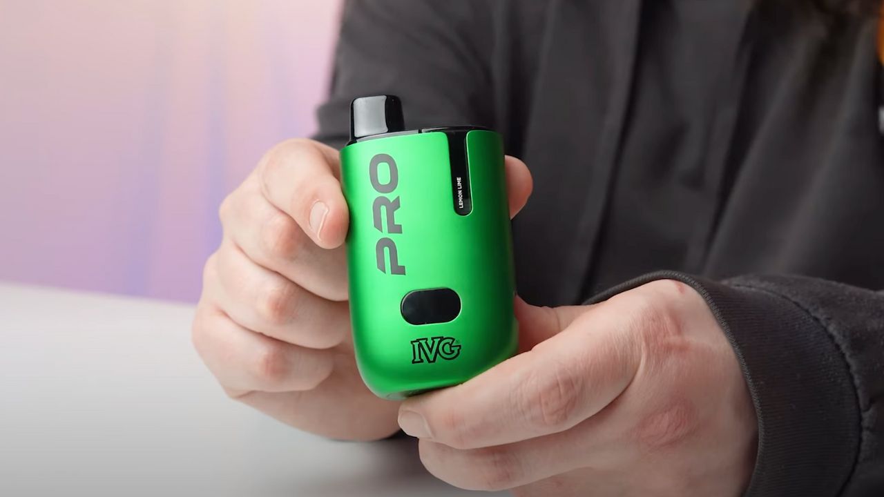 A person holding a Lemon Lime Ivg Pro 12 prefilled kit