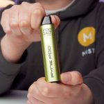Aiden from MIST holding a Pyne Pod Lime Edition