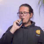 a person vaping a device that is not hitting