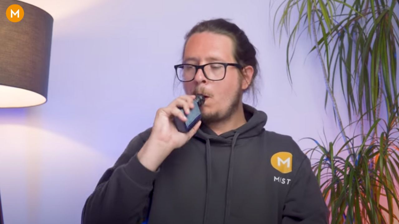 a person vaping a device that is not hitting