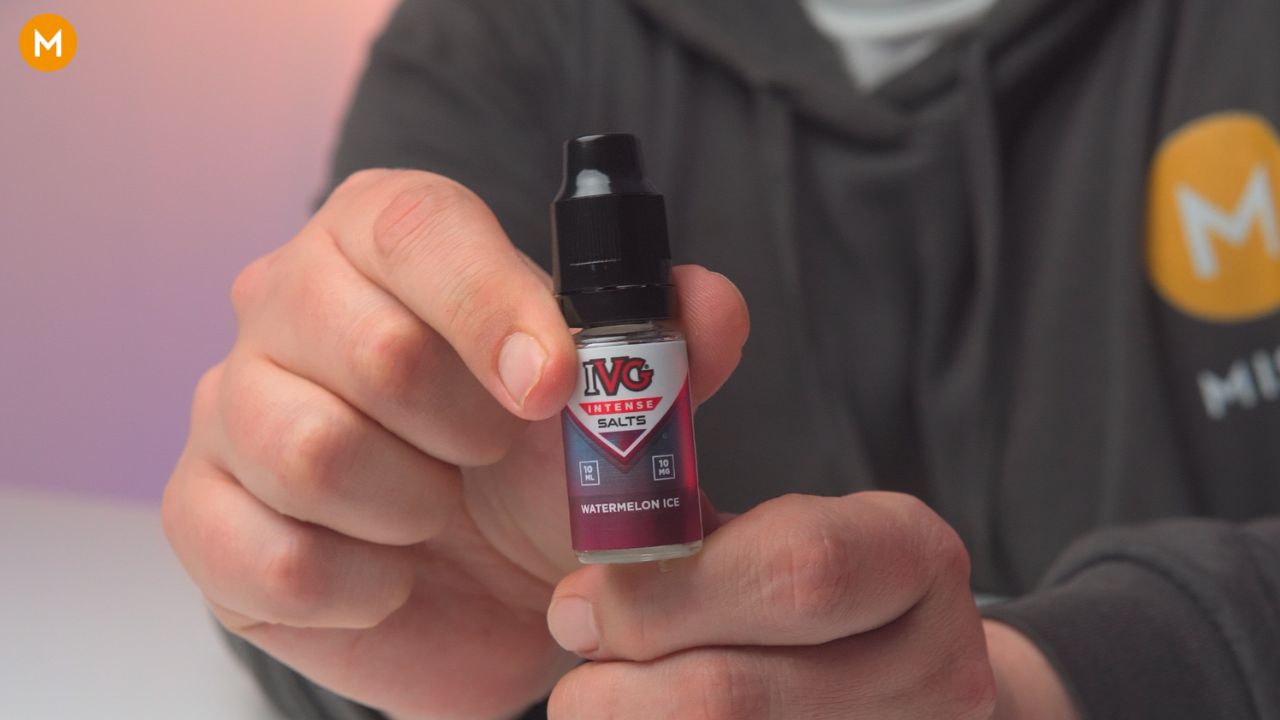 Aiden holding a bottle of IVG Intense Salts watermelon ice
