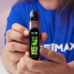 Aiden from MIST's holding the FreeMax Rexa Pro for a review