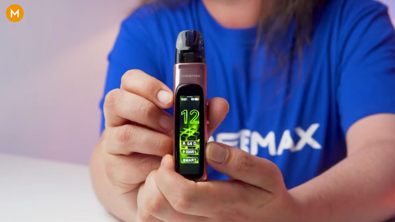 Aiden from MIST's holding the FreeMax Rexa Pro for a review